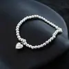 Pulsera de Diseño de Nicho con Cara Sonriente de Corazón para Mujer, Estilo Ins Cool, Cordón Elástico de Alta Calidad, Lujo Ligero, Exquisita Versión Coreana