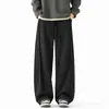 Pantalones deportivos casuales de pierna ancha holgados de corte inclinado gris pesado de pierna recta con caída, de marca moderna estilo americano/personalizado para hombres y mujeres, para otoño