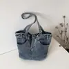 Bolsa de Ombro Feminina Design Vintage de Nicho 2026 Nova Moda Bolsa de Mão de Lona Casual Personalizada para o Dia a Dia
