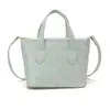 Bolsa saco feminina fashion 2026 novo modelo, elegante e pequena, cor sólida, bolsa transversal de ombro de nicho para mulheres