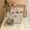 Bolsos Pequeños de Moda de Este Año para Mujer, Otoño e Invierno Retro 2025 Nuevos Bolsos de Hombro Cruzado de Nicho Madre-Hija, Bolsos Cubo