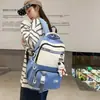 Mochila de gran capacidad, ligera y adecuada tanto para hombres como para mujeres, ideal para estudiantes de secundaria y preparatoria, perfecta para la escuela y el uso casual, y disponible para ventas transfronterizas.