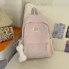 Nueva mochila escolar de alta gama transfronteriza para estudiantes de secundaria femeninas, estilo universitario, color sólido, gran capacidad, simple, versátil.