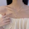 Collar de perlas nuevo 2023 para mujer, con temperamento de hada suave, cadena de clavícula de alta calidad, diseño de lujo ligero de doble capa.