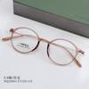 HQ20003 nuevo material ligero de grado alimenticio medio titanio moda marco redondo pequeño cara modificada miopía gafas grado de fábrica