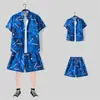 Camisa floral de manga corta, Ropa de playa de Hainan, Estilo hawaiano de Sanya, Conjunto de pantalones cortos finos de verano para hombre y pareja de viaje a Tailandia