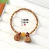 Pulsera de madera de durazno con nudo de bambú y calabaza para la riqueza, grabada con flores de ciruelo y cinabrio, un amuleto de la suerte para hombres y mujeres en su año zodiacal, trayendo éxito y progreso continuo