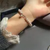 Pulsera de Cuentas de Cristal Flor de Torre para Mujer, Pulsera de Diseño Retráctil de Nicho, Temperamento de Lujo Ligero, Dulce Pulsera de Perlas