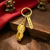 Joyería de aleación estilo étnico, llavero con colgante de cacahuete de la suerte, adorno colgante, pequeño regalo para hombres y mujeres, venta al por mayor de artesanías
