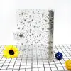 Fábrica de Shenzhen Starry PVC Binder 6 Furos Transparente B6 Caderno Couro Macio Laser Estrela Glitter Binder