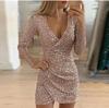 Wt03 Novo Vestido Sexy de Outono Europeu e Americano com Decote em V, Cobre o Quadril, Saia Curta Assimétrica com Lantejoulas