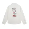 Marca de moda popular, camisa de manga larga con estampado "Beyond the Flowers", holgada y casual, adecuada para primavera y otoño, estilo masculino, camisa con cuello estilo japonés