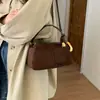 Bolso Cruzado de Moda en Gamuza Otoño 2026 para Viajar Exquisito Terciopelo Retro Nuevo Versátil de Nicho Bolso de Mano para Mujer