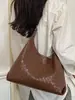 Bolsa de ombro retrô Shuai Mi Jia para mulheres 2026 nova moda trançada grande capacidade simples elegante bolsa de mão bolsa tote