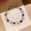 Pulsera de Lujo Ligero Estilo Francés con Cierre de Flor Ovalada de Circonita, Diseño Único, Joyería Exquisita y Versátil