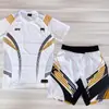 Boxe e Sanda Transfronteiriço 2026 Novo Mais Vendido Jiu-Jitsu Brasileiro Artes Marciais Mistas Esportes Manga Curta Conjunto de Shorts de 5 Pontos