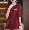 Comercio Electrónico Transfronterizo~Camiseta de Manga Corta de Alta Gama con Etiqueta Cortada Reductora de Edad Diseño Elegante Holgado para Ocultar el Vientre Talla Grande Top Elegante