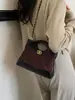 Bolso transfronterizo Yozhi estilo pequeño Chanel, nueva colección 2026, bolso de hombro patchwork de gamuza, exquisito bolso cruzado tipo sobre con cadena