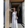 668 # Vestido negro de dos piezas fuera del hombro para mujer, 2026 vestido largo de alta gama elegante fuera del hombro que marca la cintura, vestido sin tirantes