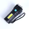 Linterna LED ultra brillante de alta potencia de cuatro núcleos de largo alcance recargable portátil y duradera luz para el hogar al aire libre camping