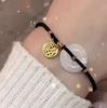 Pulsera de Cuerda Roja de Buena Suerte Flor de Ciruelo Cuerda para Pareja Simple Hecha a Mano Cuerda Tejida Paz y Alegría Regalo para Novia