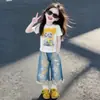 Conjunto de Verano 2026 para Niñas Nuevo Elegante Camiseta de Manga Corta y Shorts de Mezclilla Conjunto de Dos Piezas Moderno