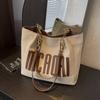 Bolsa de Ombro Casual da Moda Transfronteiriça Feminina 2024 Nova Grande Capacidade Bolsa de Mão Tote com Letras Versátil para Trabalho e Escola