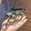 Llavero de juguete de perro robot mecánico, plegable, adecuado para bolsos de parejas y accesorios de coche, juguete de perro robot al por mayor