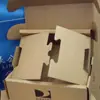 Caja de cartón corrugado impresa a tres colores, caja de cartón para express bien empaquetada con separadores, protección para huevos, protección para frutas, resistente al por mayor