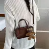 Moda Otoño/Invierno 2026 Bolso Versátil de Cuero Mate Bolso para el Trabajo Cuero Suave Estilo Retro Simple Elegante Bolso Cruzado