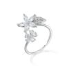 Anillo hueco de circonio chapado en platino y cobre KJ para mujer, estilo japonés y coreano, con diseño de flor abierta, elegante y tridimensional.