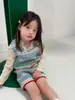 Conjunto de Dos Piezas de Ropa Coreana para Niñas Otoño/Invierno 2026, Chaleco de Punto Floral Vintage y Shorts
