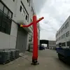 Fábrica de origen produce hombre inflable bailarín realista con expresión de cara sonriente roja, utilizado como accesorio promocional para aperturas de tiendas, admite diseños personalizados