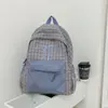 Nova Mochila Escolar Estilo Coreano de Comércio Exterior para Meninas do Ensino Fundamental Mochila Casual Xadrez Versátil Grande Capacidade Mochila de Duas Alças para Ensino Médio Personalização