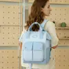 Bolsa tote fashion de bloco de cores nova e multifuncional transfronteiriça, bolsa maternidade em tecido Oxford, bolsa de fraldas portátil para mães e bebês