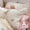Juego de cama de cuatro piezas Clase A hecho de algodón puro tipo puff, sábana y funda de edredón estilo ins frescas y delicadas con borde de concha, juego de tres piezas para dormitorios de estudiantes