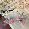 Lindos pasadores de flores estilo coreano para niños en colores de caramelo, versátiles para recoger el cabello suelto, no dañan, perfectos para sesiones de fotos