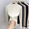 Top de capa base de alta gama con bordes rizados, cuello semi-alto, suéter de punto elegante en capas para mujer para Primavera, Otoño e Invierno 2026