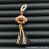 Bodhi Xingyue con Accesorios de Madera de Durazno, Juguete Pequeño de Goteo, Accesorio de Mano Desmontable con Asa de Oso/Pulsera