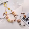 Lanyard para Teléfono Móvil Estilo Nuevo Niñas Lindo Felpa Estampado de Leopardo Estrellas Accesorios Abalorios Hechos a Mano Exquisita Cadena Portátil Estilo Corto