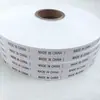 En Stock Fabricado en China Etiqueta Lavable Origen Madeinchina Número de Lote Zapatos Sombreros Bolsas Etiqueta Lavable Jitai