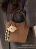 Bolso de Mano Pequeño de Moda y Tendencia para Mujer 2026 Nuevo Modelo Bolso Cruzado Exquisito y Versátil con un Toque de Lujo Bolso de Hombro Único Bolso Tote Pequeño