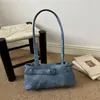 Moda para ir al trabajo color liso para mujer 2026 hebilla de cinturón de cuero PU elegante casual gran capacidad exquisita bolso de hombro baguette para debajo del brazo