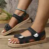 Sandalias planas casuales de mujer con correa de velcro, moda casual cruzada europea y americana, otoño 2026, tacón bajo, venta al por mayor