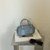 Nova moda outono de 2026, bolsa Boston simples texturizada, bolsa de ombro e transversal vintage de alto valor em formato de travesseiro