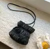 Bolso tote casual de PU plisado de verano, bolso de hombro versátil de estilo coreano nicho para el trabajo, bolso cruzado móvil transfronterizo para mujer