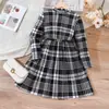 Comercio exterior transfronterizo ropa infantil niños medianos y grandes nueva para niñas primavera y otoño manga larga a cuadros rayado vestido casual DQ1435-