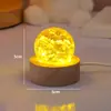 Venta al por mayor transfronteriza de bolas de cristal de hielo agrietado de colores, bolas de cristal de cielo estrellado brillante, luces nocturnas, adornos decorativos de escritorio y luces ambientales