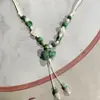 Collar con colgante de campana de mariposa de cerámica de estilo étnico retro para mujer, diseño nuevo y moderno, cadena larga para suéter, accesorios