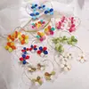 Pendientes de Flores de Rafia Transfronterizos Europeos y Americanos de Primavera y Verano con Diseño de Moda en Forma de Arco y Pendientes Tejidos a Mano en Forma de C